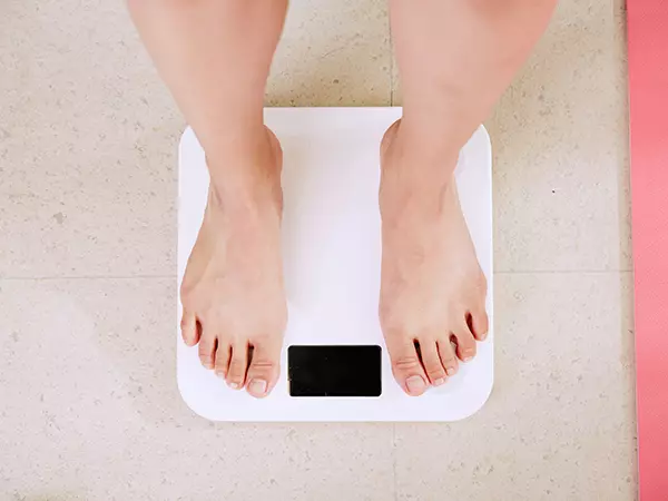feet on scales after weight loss surgery financing